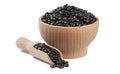 Black bean in wooden bowl and scoop isolated on white background. nutrition. food ingredient Royalty Free Stock Photo