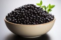 Black beans in a bowl on a white background. Selective focus. Generative AI Royalty Free Stock Photo
