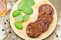 Black beans brown rice walnut oat burgers with spinach Royalty Free Stock Photo