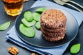 Black beans brown rice walnut oat burgers with spinach Royalty Free Stock Photo