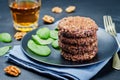 Black beans brown rice walnut oat burgers with spinach Royalty Free Stock Photo