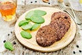 Black beans brown rice walnut oat burgers with spinach Royalty Free Stock Photo