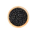 Black beans in wooden bowl isolated on white background.Top view Royalty Free Stock Photo