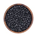Black beans in wooden bowl isolated on white background, top view Royalty Free Stock Photo