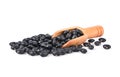 Black beans and wooden scoop isolated on white background Royalty Free Stock Photo