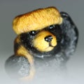 Black bear figurine with a hat