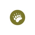 Black bear trace silhouette in green circle. Vector flat illustration. polar bear paw footprint