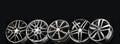 black beautiful sports alloy wheels forged stand in a row Royalty Free Stock Photo