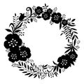 Black beautiful wreath of flowers and plants.