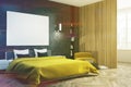 Black bedroom, yellow bed, poster side toned Royalty Free Stock Photo