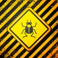 Black Beetle bug icon isolated on yellow background. Warning sign. Vector Royalty Free Stock Photo