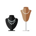 Black and beige busts with beads and necklace.