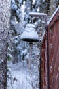 Black bell in garden after snow blizzard. Royalty Free Stock Photo