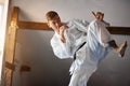 Black belt karate fighter training hight kick Royalty Free Stock Photo