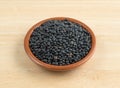 Black beluga lentils in a bowl on a table