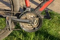 Black bicycle pedal on a metal sprocket with a chain on a sports bike Royalty Free Stock Photo