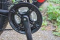 Black bicycle pedal on a metal sprocket with a chain Royalty Free Stock Photo