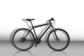 Black bicycle on monochrome background