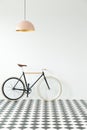 Black bike in simple interior