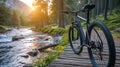 Black bike on wooden floor near the rivers background at morning, Object and nature concept
