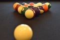 Black billiard table, Playing snooker pool 8ball - Close-up shot of a man playing billiard Royalty Free Stock Photo