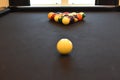 Black billiard table, Playing snooker pool 8ball - Close-up shot of a man playing billiard Royalty Free Stock Photo