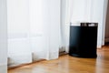 A black bin at the window Royalty Free Stock Photo