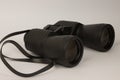 A black binoculars on a white background Royalty Free Stock Photo
