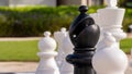 A black Bishop chess piece ready to move against an opponent Royalty Free Stock Photo