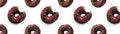 Black bited donuts with red glaze on white background seamless pattern top view. Food dessert flatly flat lay of