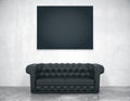 Black blank picture frame on the concrete wall and leather sofa, mock up Royalty Free Stock Photo