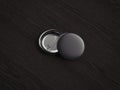 Black pin buttons on dark wooden background, 3d rendering. Royalty Free Stock Photo
