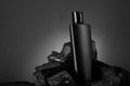 Black Blank Product Bottle on Black Stone for Mockups