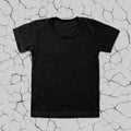Black blank t-shirt on cracked background
