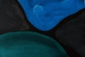 Black blue green abstract background. Colorful ink blots and stains, wallpaper print. Creative backdrop Royalty Free Stock Photo