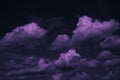 Black blue purple sky with pink clouds. Night dark dramatic sky background for design.