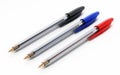 Black, blue and red ball point pens isolated on white. 3D illustration