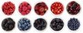 Black-blue and red berries isolated on white background. Collage of different fruits and berries. Blueberry, blackberry, mulberry, Royalty Free Stock Photo