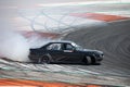 Black BMW E34 drifting during a race in Spain Royalty Free Stock Photo
