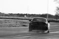 Black BMW Z4 crazy drifting on a race track