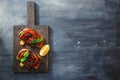 Black board with appetizer with aubergines and bell peppers. Royalty Free Stock Photo