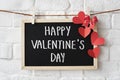 Text Happy Valentine`s Day written on a blackboard