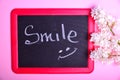 Black board with an inscription smile