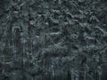 Black stone or slate background or texture.Stone black background texture. Blank for design.Black stone wall background.