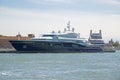 Black boat on the quay at the port of Venice