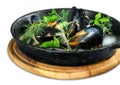Copper pot of gourmet mussels served on a napkin