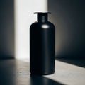 Black Bottle on Dark Surface Royalty Free Stock Photo