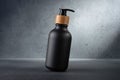 Black bottle with dispenser pump for cosmetics and beauty or bathroom products Royalty Free Stock Photo