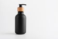 Black bottle with dispenser pump for liquid soap, gel, lotion, cream, shampoo and other cosmetics Royalty Free Stock Photo