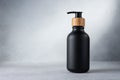 Black bottle with dispenser pump for liquid soap, gel, lotion, cream, shampoo and other cosmetics Royalty Free Stock Photo